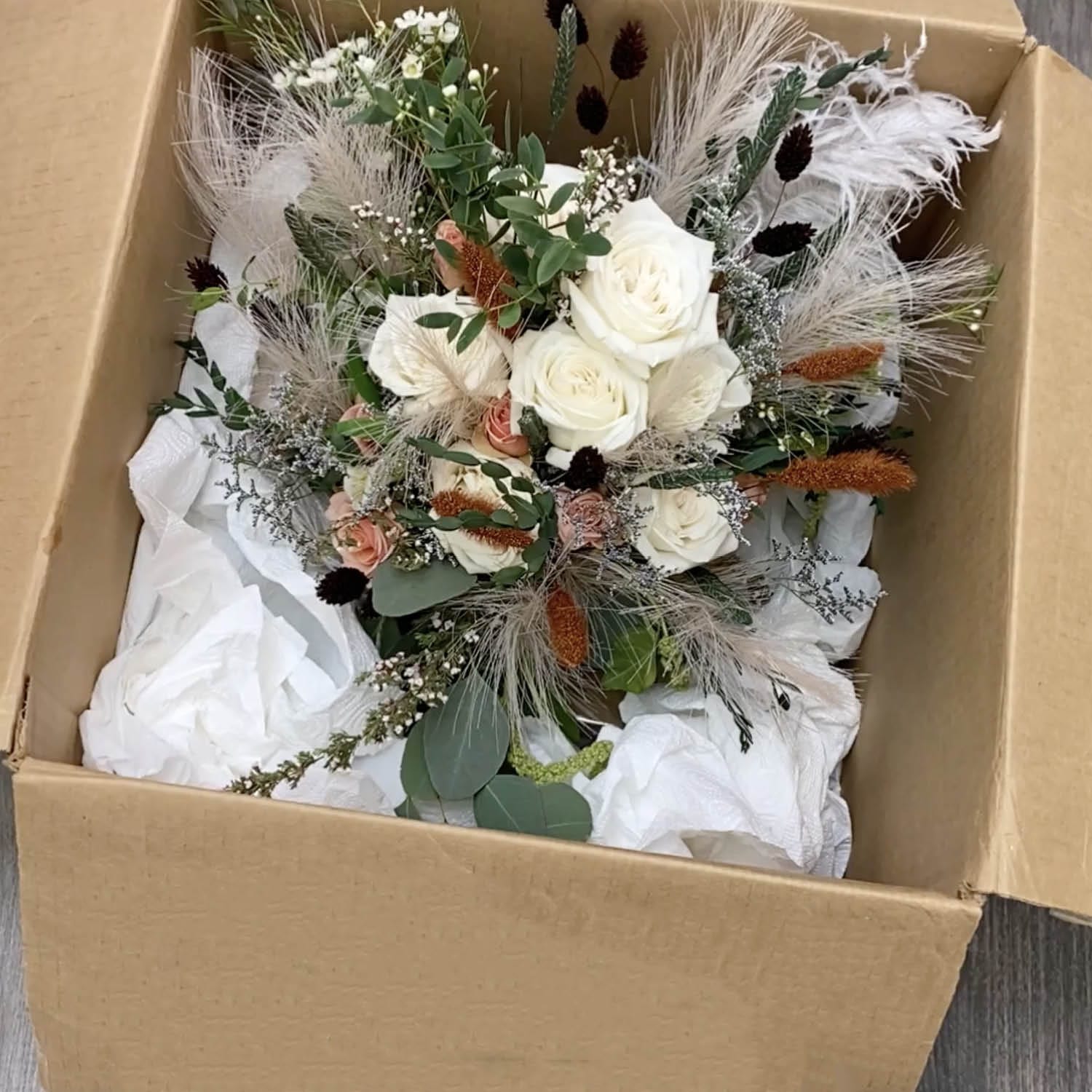 Flowers in box preparing to ship - DBAndrea